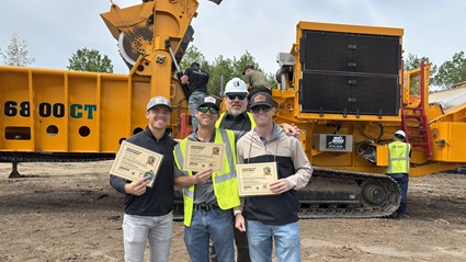 Powerscreen of Florida representatives with Nick Furey, CBI Regional Sales Manager, receiving their ‘Certified Grinding Operator’ certificates