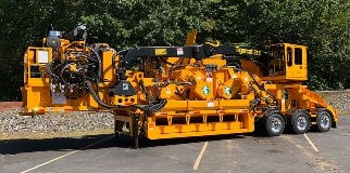 604 chain flail debarker with loader