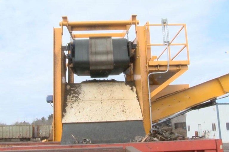 electromagnet for railroad tie grinding