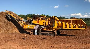 CBI forestry grinder used for land clearing.