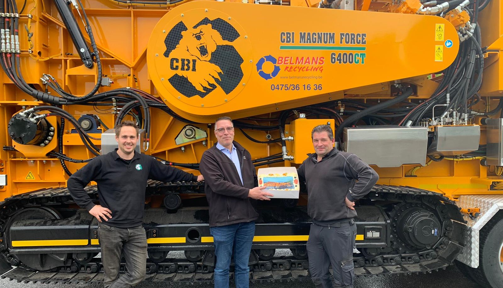 Richard Kogelman provides a CBI cake upon delivery of 6400CT Horizontal Grinder