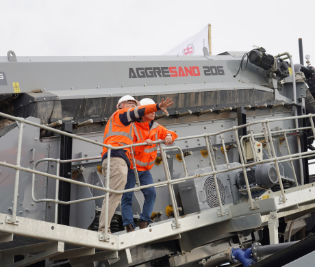 Team Members looking at the Aggresand 206